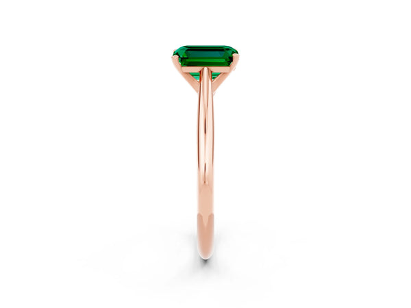Rose gold Emerald Cut Emerald Solitaire Engagement Ring with Cathedral Setting and Four-Prong Mount