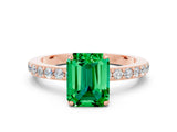 Rose gold Emerald Cut Emerald Solitaire Engagement Ring with Pavé Band and Four-Prong Setting