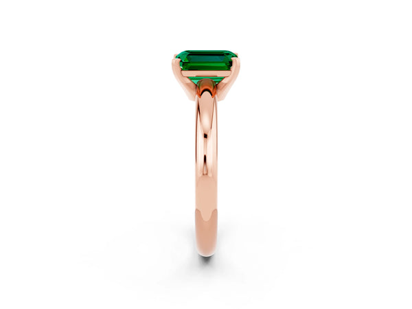 Rose gold Emerald Cut Emerald Solitaire Engagement Ring with Round Band and Four-Prong Setting