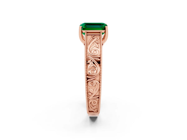 Rose gold Emerald Cut Emerald Solitaire Ring with Engraved Band and Four-Prong Setting