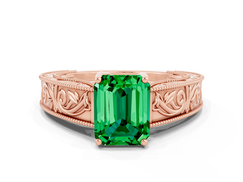 Rose gold Emerald Cut Emerald Solitaire Ring with Engraved Band and Four-Prong Setting
