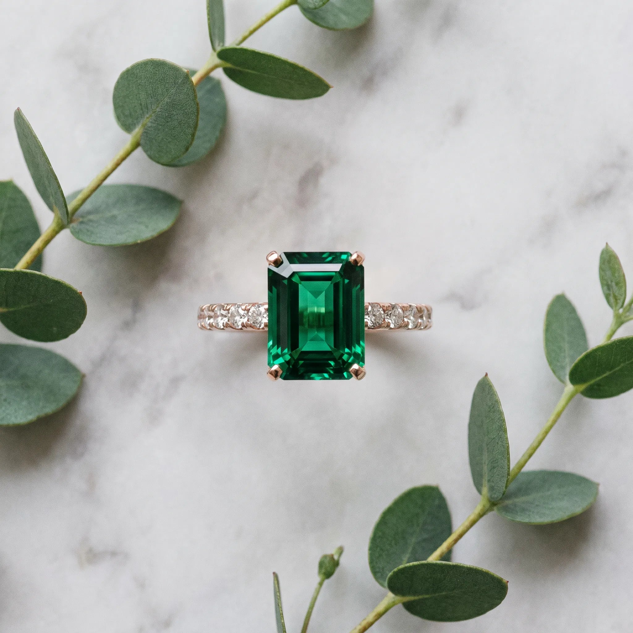 Rose gold Emerald Cut Emerald Solitaire Ring with Round  Pavé Band and Four-Prong Setting_45