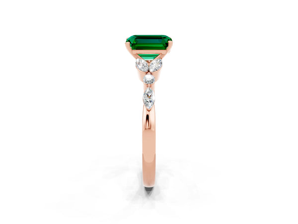 Rose gold Emerald Cut Emerald Solitaire Ring with Side Stones and Four-Prong Setting