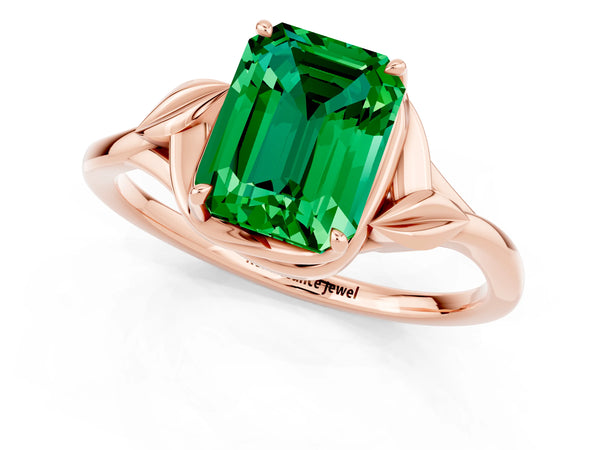 Rose gold Emerald Cut Emerald Solitaire Ring with Twist Band and Four-Prong Setting