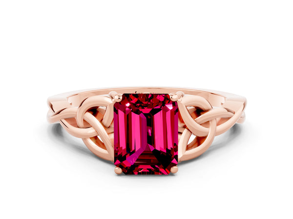 Rose gold Emerald Cut Garnet Solitaire Engagement Ring with Celtic Knot Band and Four-Prong Setting