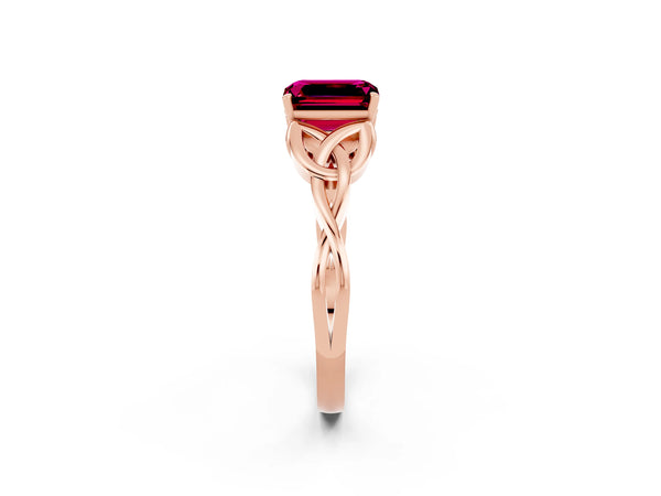 Rose gold Emerald Cut Garnet Solitaire Engagement Ring with Celtic Knot Band and Four-Prong Setting