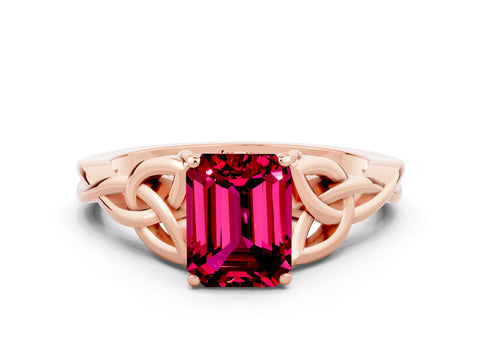 Rose gold Emerald Cut Garnet Solitaire Engagement Ring with Celtic Knot Band and Four-Prong Setting
