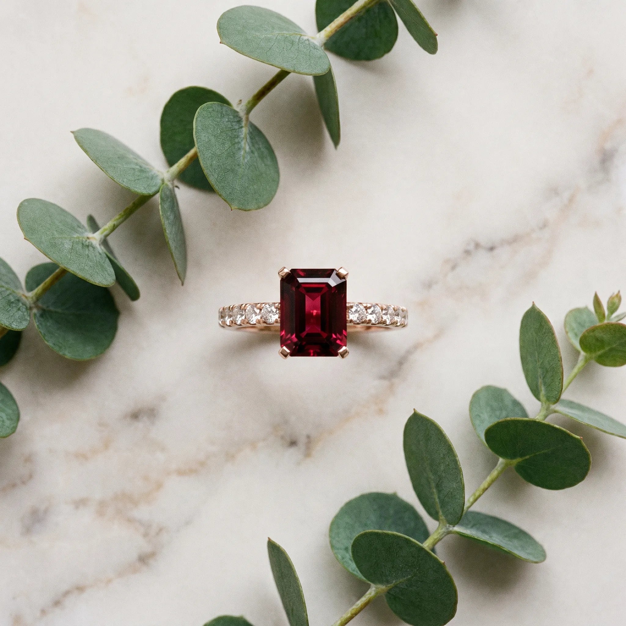 Rose gold Emerald Cut Garnet Solitaire Ring with Round  Pavé Band and Four-Prong Setting_45