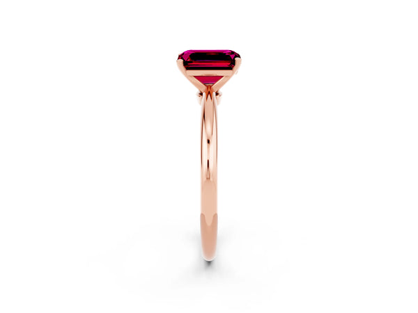 Rose gold Emerald Cut Garnet Solitaire Ring with Six-Prong Setting and Classic Band