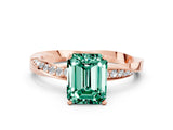 Rose gold Emerald Cut Green Sapphire Engagement Ring with Side Stone Accents and Four-Prong Setting_60