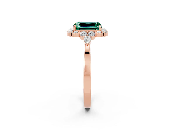 Rose gold Emerald Cut Green Sapphire Halo Ring with Pear Side Stones and Prong Setting