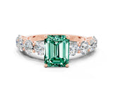 Rose gold Emerald Cut Green Sapphire Prong Setting with Side Stones on a Pave Band