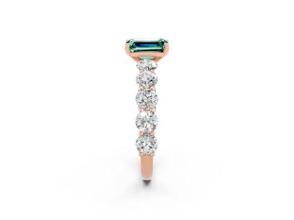 Rose gold Emerald Cut Green Sapphire Prong Setting with Side Stones on a Pave Band