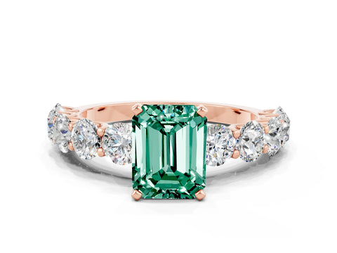 Rose gold Emerald Cut Green Sapphire Prong Setting with Side Stones on a Pave Band