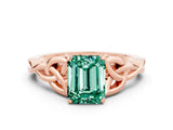 Rose gold Emerald Cut Green Sapphire Solitaire Engagement Ring with Celtic Knot Band and Four-Prong Setting