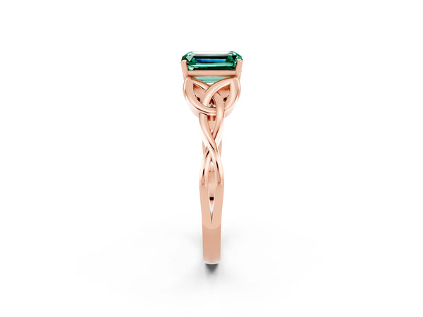 Rose gold Emerald Cut Green Sapphire Solitaire Engagement Ring with Celtic Knot Band and Four-Prong Setting