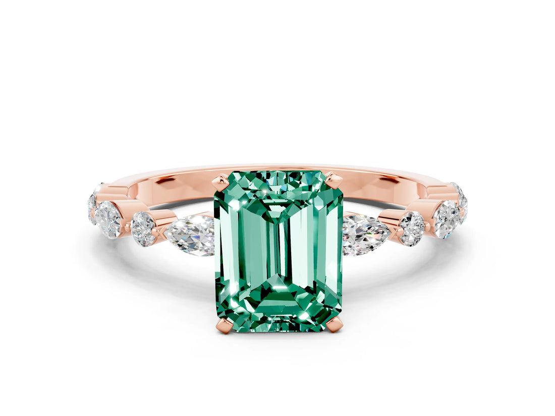 Rose gold Emerald Cut Green Sapphire Solitaire with Side Stones on a Pavé Band and Four-Prong Setting
