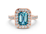 Rose gold Emerald Cut Halo Diamond Ring with Pavé Band and Three-Prong Setting
