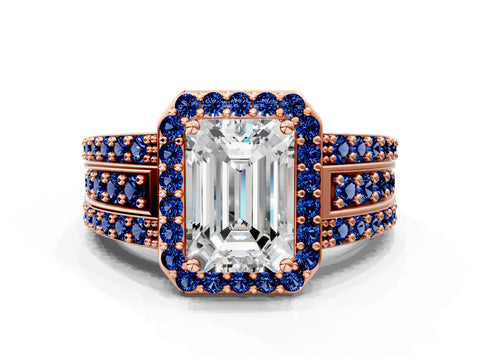 Rose gold Emerald Cut Halo Diamond Ring with Round with Blue Sapphire side stone Split Shank and Prong Setting