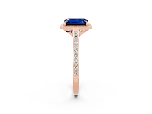 Rose gold Emerald Cut Blue Sapphire Halo Engagement Ring with Round Pavé Shoulders and Prong Setting