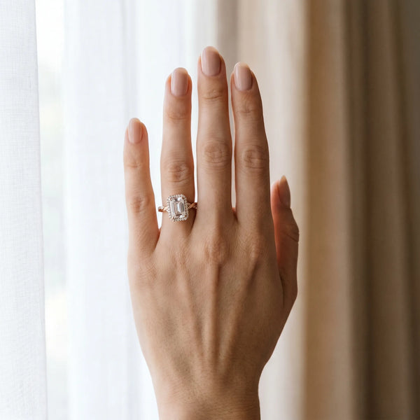 Rose gold Emerald Cut Halo Twisted Band Four-Prong Ring