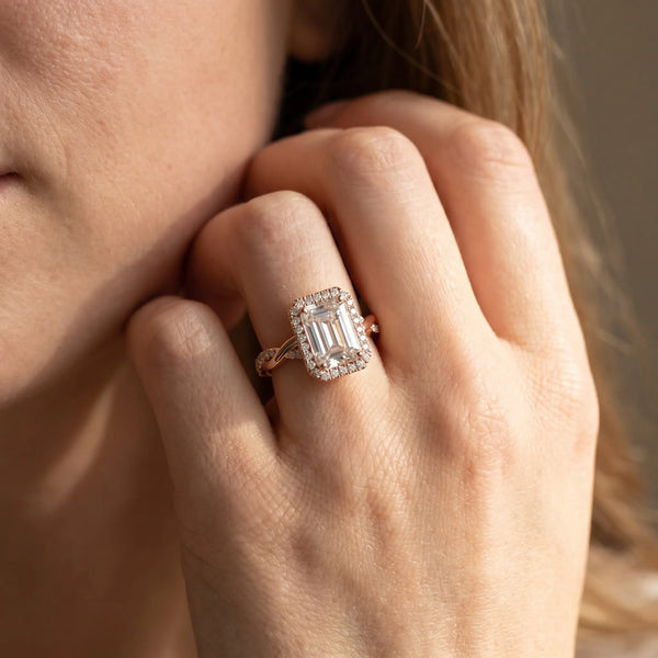 Rose gold Emerald Cut Halo Twisted Band Four-Prong Ring