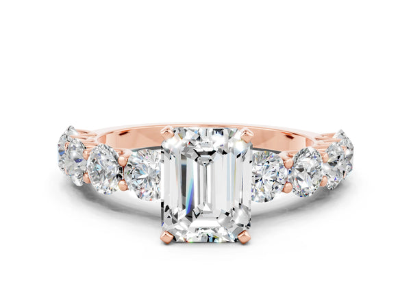 Rose gold Emerald Cut Moissanite Prong Setting with Side Stones on a Pave Band