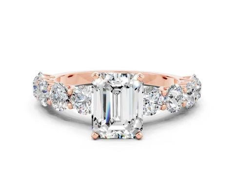 Rose gold Emerald Cut Moissanite Prong Setting with Side Stones on a Pave Band