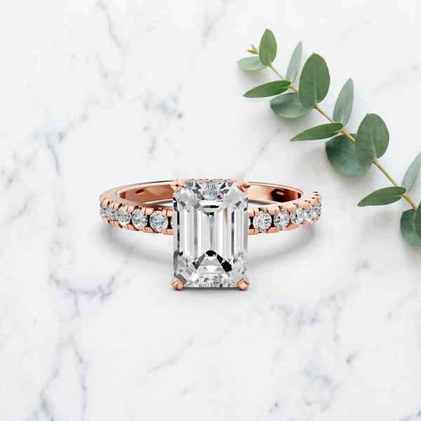 Rose gold Emerald Cut Moissanite Solitaire Ring with Round  Pavé Band and Four-Prong Setting