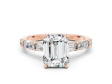 Rose gold Emerald Cut Moissanite Solitaire with Side Baguettes and Channel Set Band