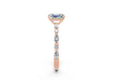 Rose gold Emerald Cut Moissanite Solitaire with Side Stones on a Pavé Band and Four-Prong Setting_2
