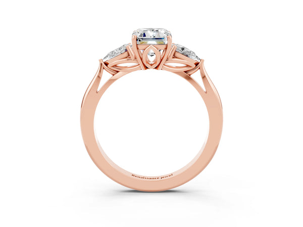 Rose gold Emerald Cut Moissanite Three-Stone Ring with Pear  Side Stones and Prong Setting