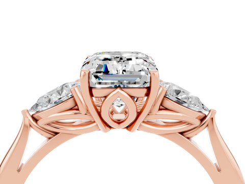 Rose gold Emerald Cut Moissanite Three-Stone Ring with Pear Side Stones and Four-Prong Setting_16