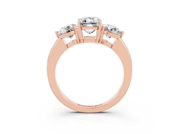 Rose gold Emerald Cut Moissanite Three-Stone Ring with Prong Setting and Classic Band