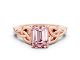 Rose gold Emerald Cut Morganite Solitaire Engagement Ring with Celtic Knot Band and Four-Prong Setting