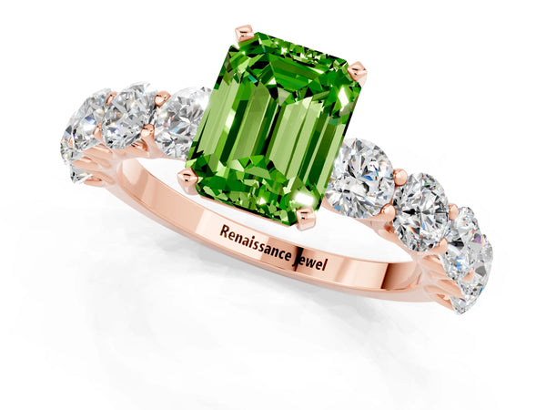 Rose gold Emerald Cut Peridot Prong Setting with Side Stones on a Pave Band
