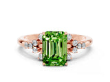 Rose gold Emerald Cut Peridot Ring with Side Stones and Four-Prong Setting_36