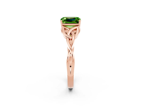 Rose gold Emerald Cut Peridot Solitaire Engagement Ring with Celtic Knot Band and Four-Prong Setting