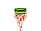 Rose gold Emerald Cut Peridot Solitaire Engagement Ring with Celtic Knot Band and Four-Prong Setting_5