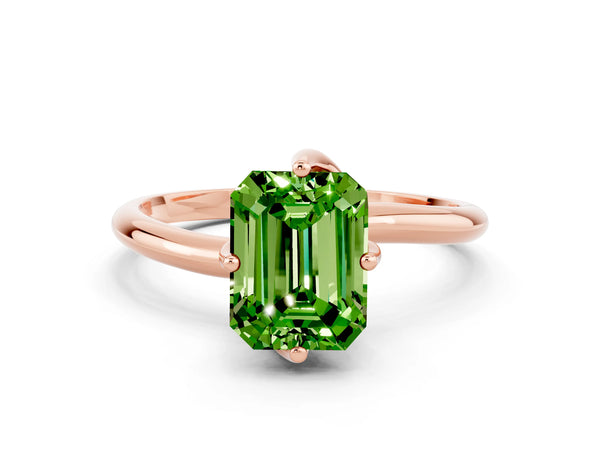 Rose gold Emerald Cut Peridot Solitaire Engagement Ring with Four-Prong Setting and Classic Band
