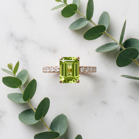 Rose gold Emerald Cut Peridot Solitaire Ring with Round  Pavé Band and Four-Prong Setting_45
