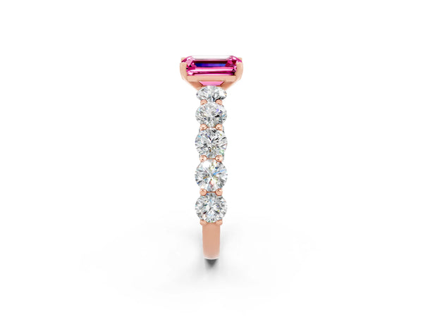 Rose gold Emerald Cut Pink Sapphire Prong Setting with Side Stones on a Pave Band
