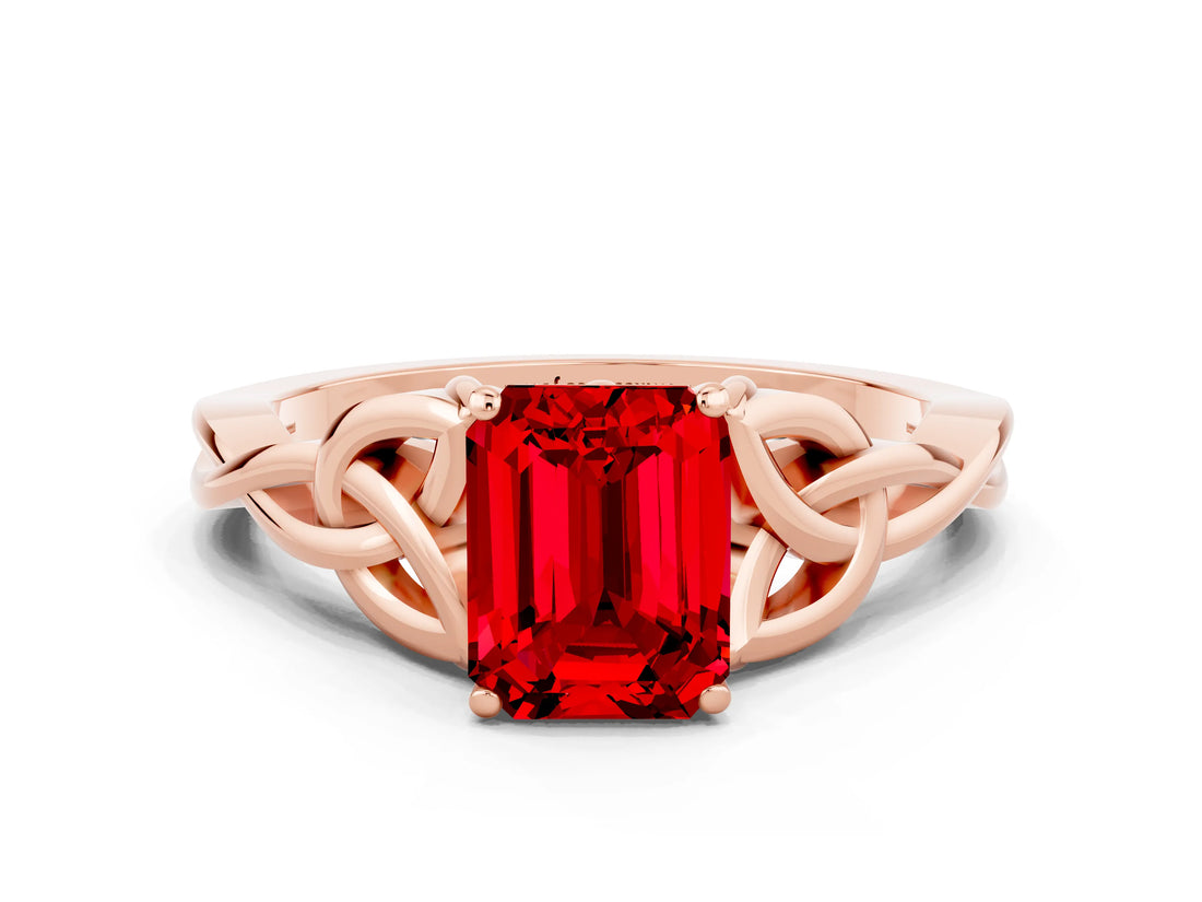 Rose gold Emerald Cut Ruby Solitaire Engagement Ring with Celtic Knot Band and Four-Prong Setting