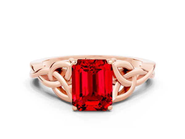 Rose gold Emerald Cut Ruby Solitaire Engagement Ring with Celtic Knot Band and Four-Prong Setting