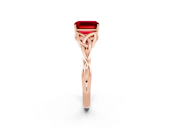 Rose gold Emerald Cut Ruby Solitaire Engagement Ring with Celtic Knot Band and Four-Prong Setting