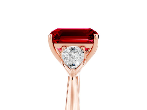 Rose gold Emerald Cut Ruby Three-Stone Ring with Pear Side Stones and Four-Prong Setting_17