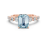 Rose gold Emerald Cut Solitaire Aquamarine Ring with Pave Band and Four-Prong Setting