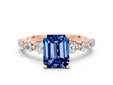 Rose gold Emerald Cut Solitaire Blue Sapphire Ring with Pave Band and Four-Prong Setting