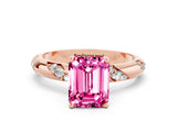 Rose gold Emerald Cut Solitaire Diamond Engagement Ring with Twisted Pave Band and Four-Prong Setting