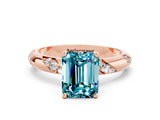 Rose gold Emerald Cut Solitaire Diamond Engagement Ring with Twisted Pave Band and Four-Prong Setting